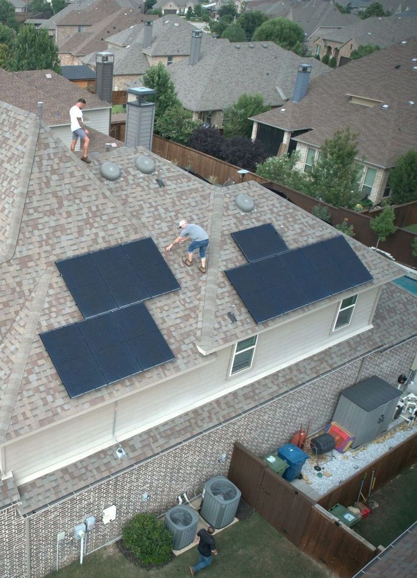 man installing solar panel
