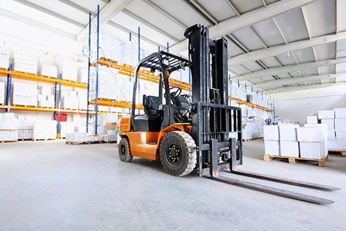 Orange Lift Truck — Miami, FL — Naveles Industrial Sales