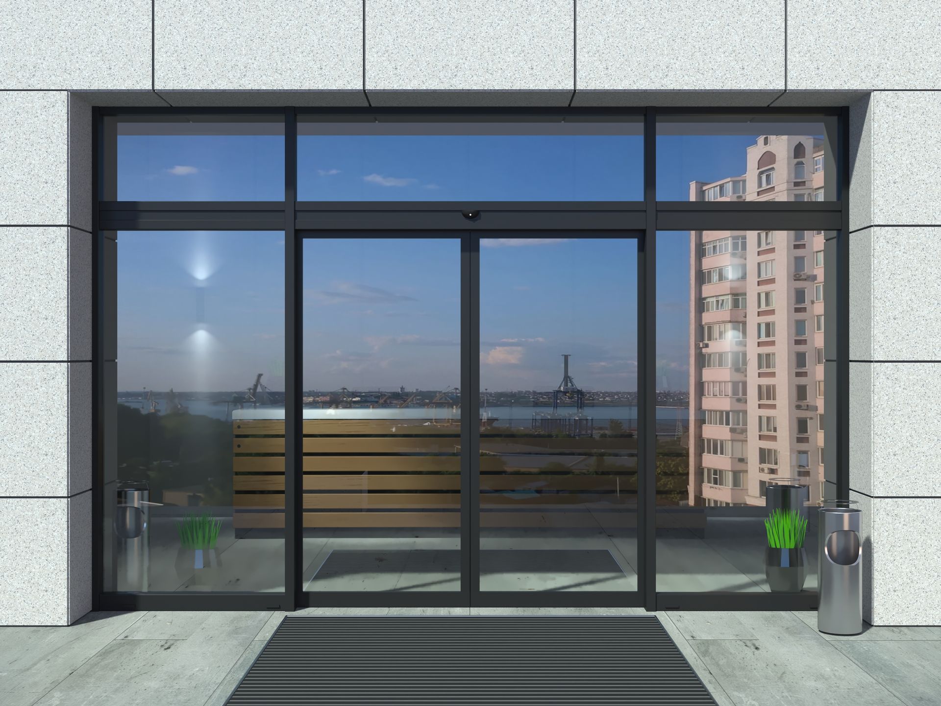 A large sliding glass door with a view of the statue of liberty.