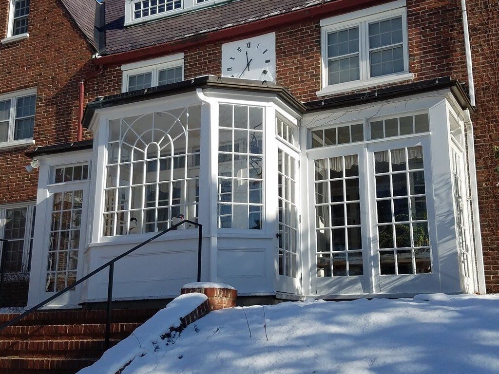 A large brick building with a clock on top of it