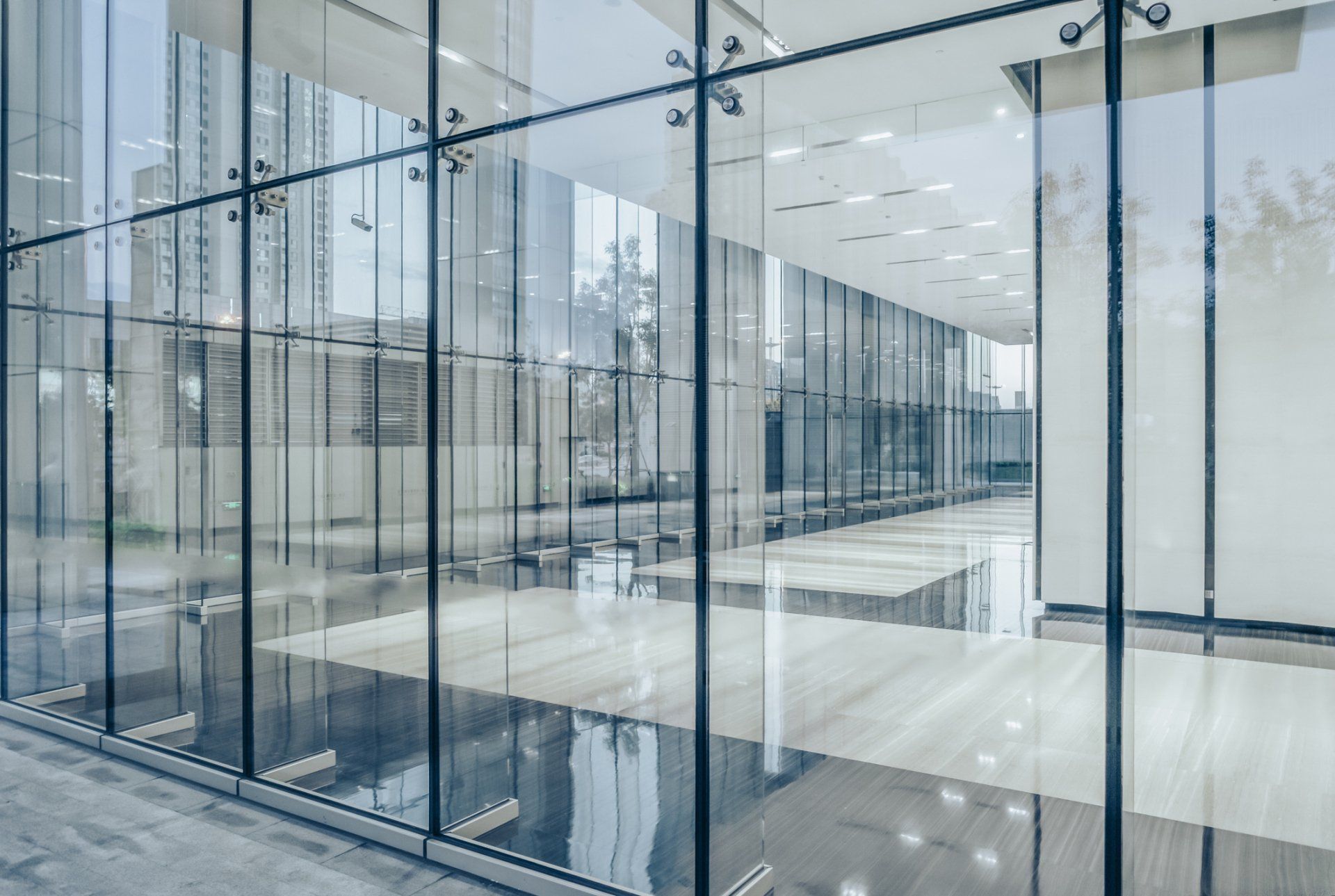 A large building with a lot of windows and a wooden floor.