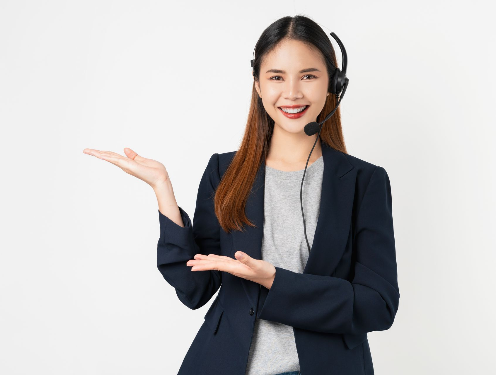 Person using a laptop, reviewing digital resumes with a magnifying glass, possibly for hiring.