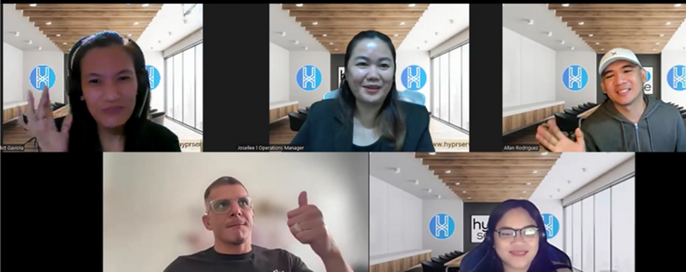 Warehouse interior with tall shelves stacked with boxes, illuminated by sunlight.