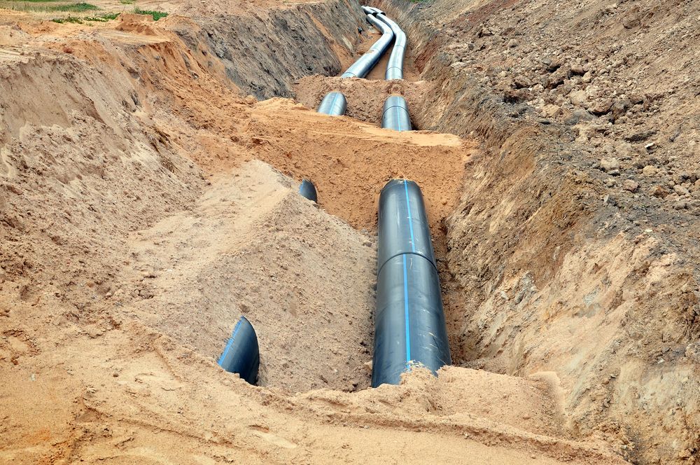 Pipes in a Trench, Ready for Burial — Far North Plumbing in Mourilyan, QLD