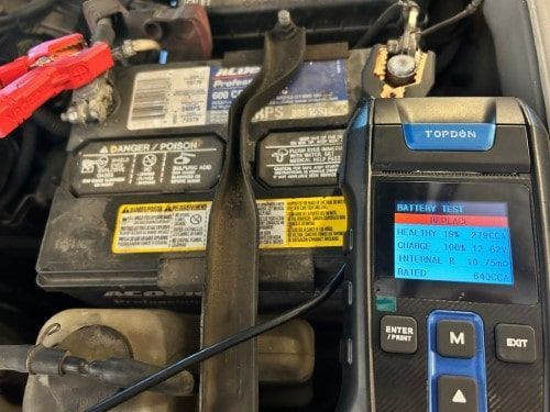 Eurasian Auto Repair Battery Checks During San Antonio Heat Waves