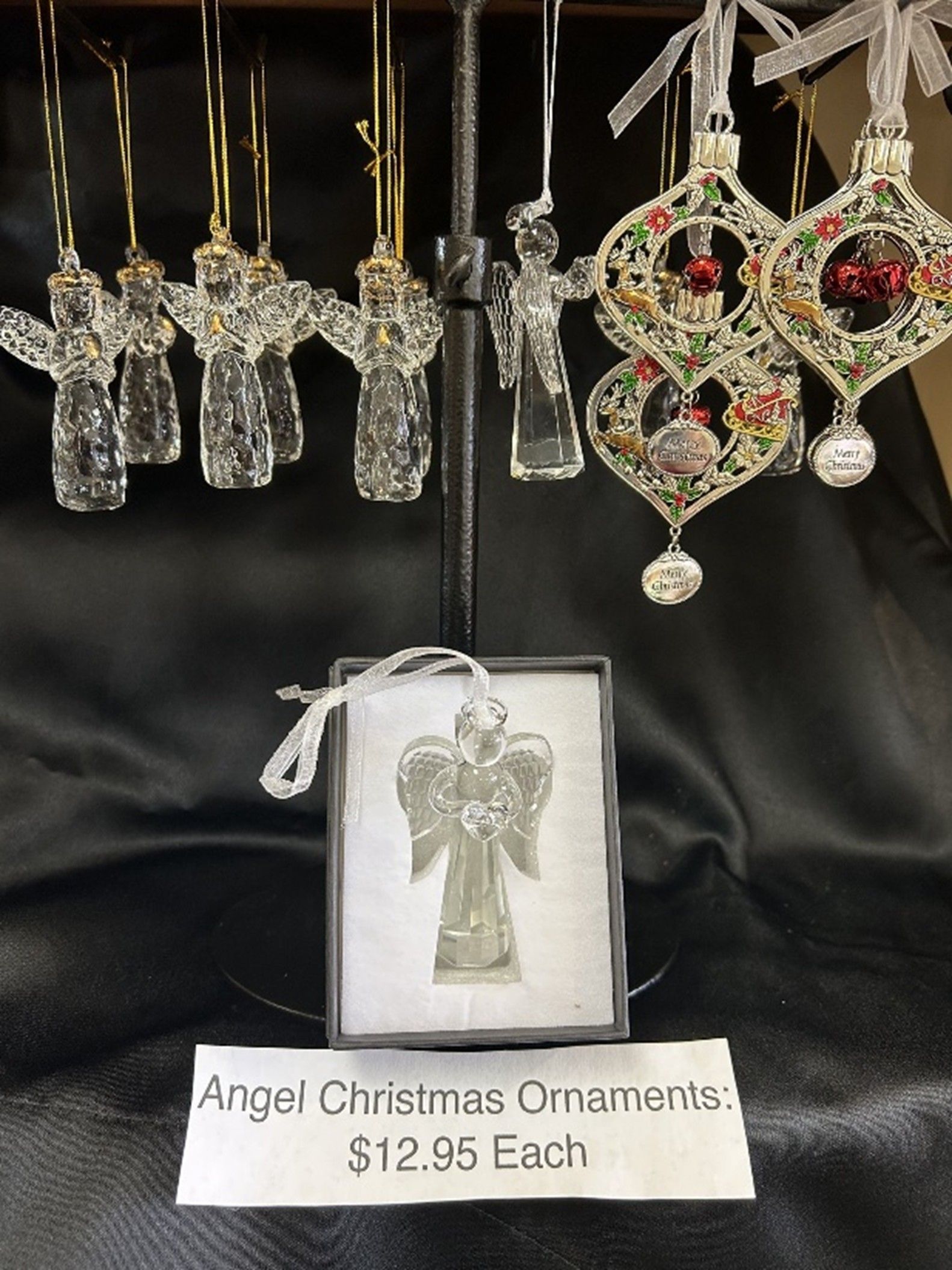 Christmas ornaments of angels in various designs, priced at $12.95 each.