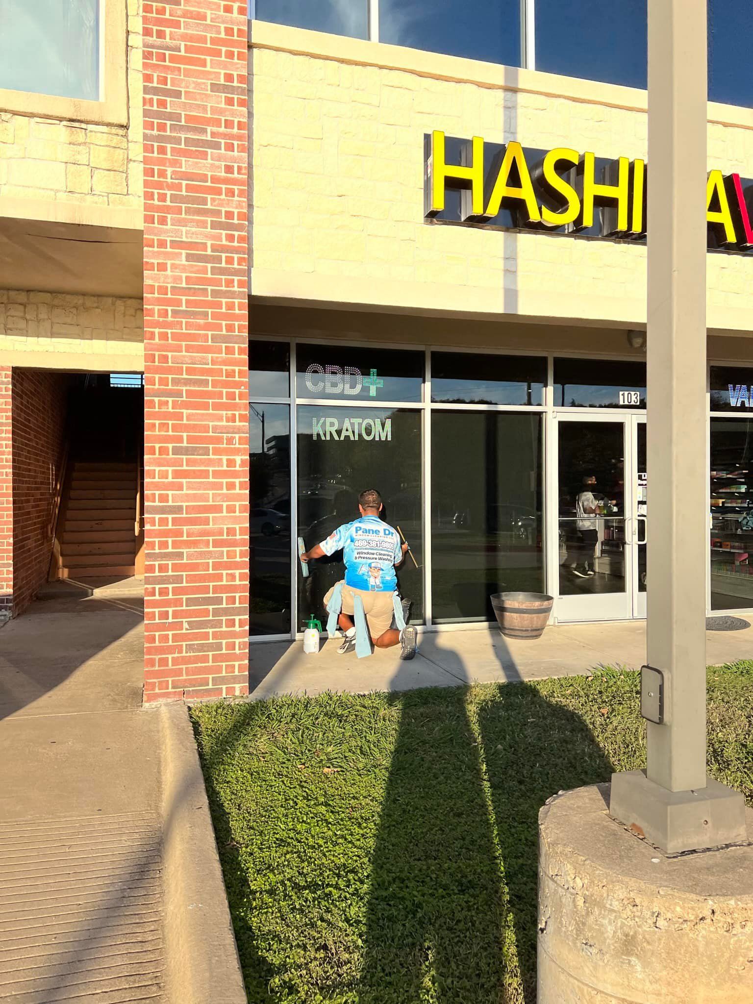 Man cleaning window of 