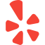 Red Yelp logo: stylized flower shape with six petals.