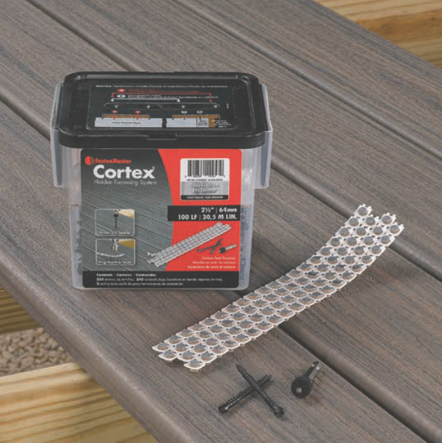 Cortex hidden fasteners kit with screws, strips, and tool on a composite deck.