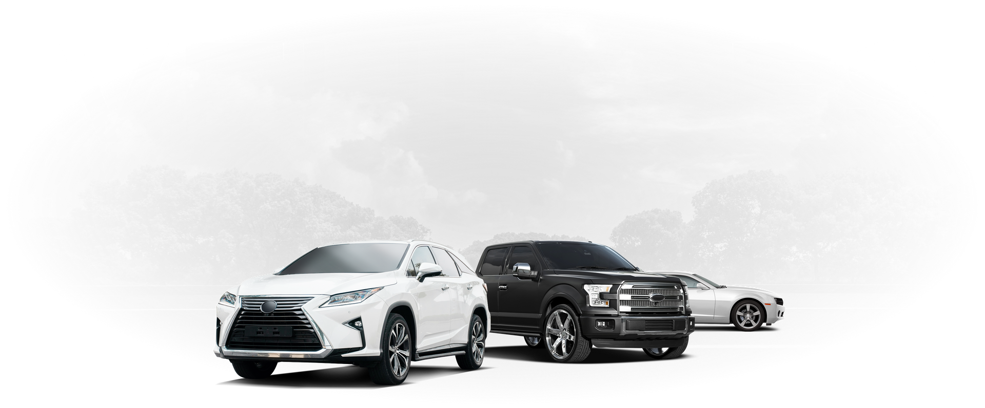 Three cars are parked next to each other on a white background. | Barclay Automotive