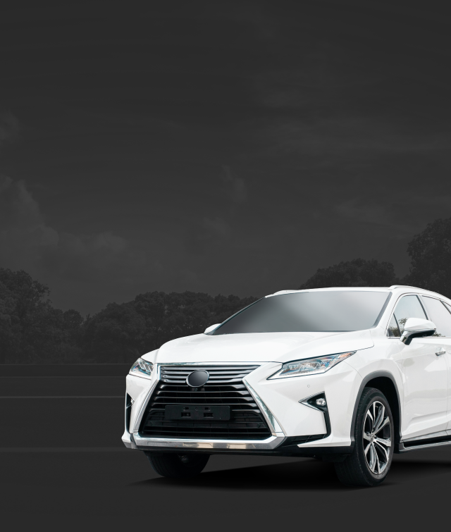 A white lexus rx is parked on a white background. | Barclay Automotive