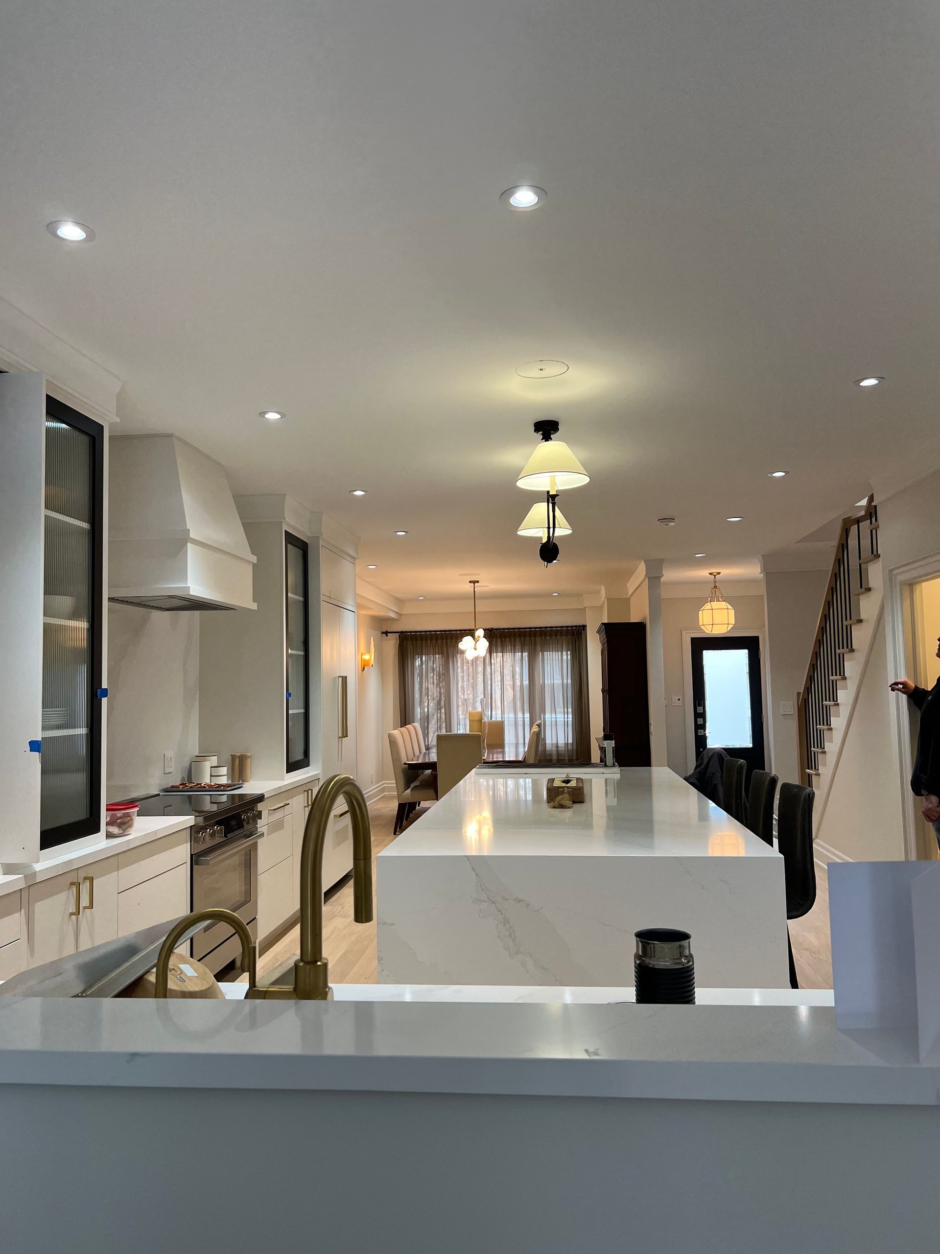A kitchen with a large island in the middle of the room.