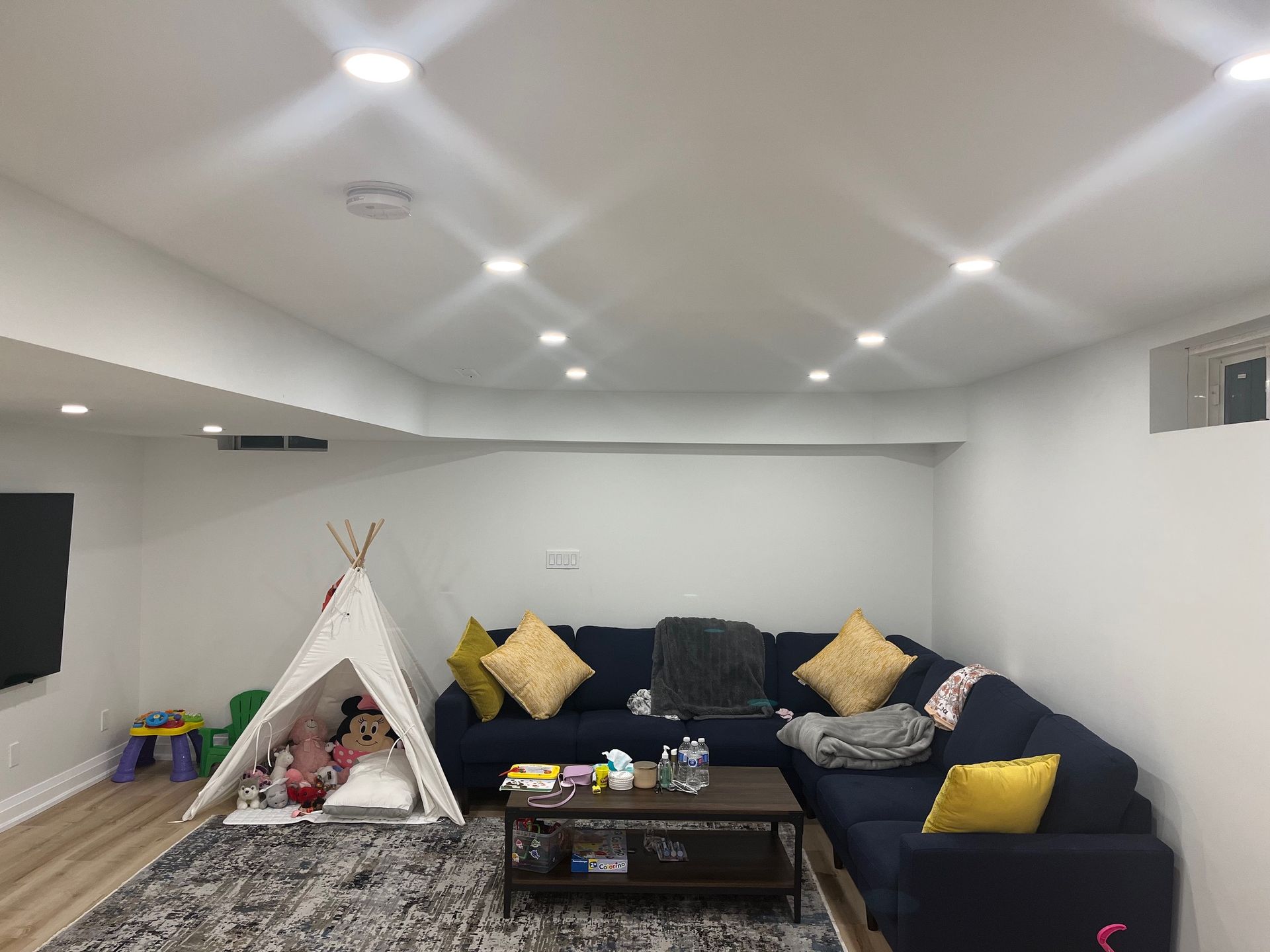 Pot light install for family room.