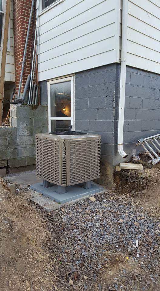 Gray Air Condition with Gray Wall — Cumberland, MD — Growden Heating And Cooling