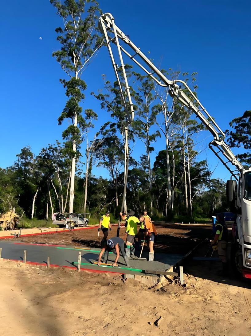 Group of Workers Constructing a Road