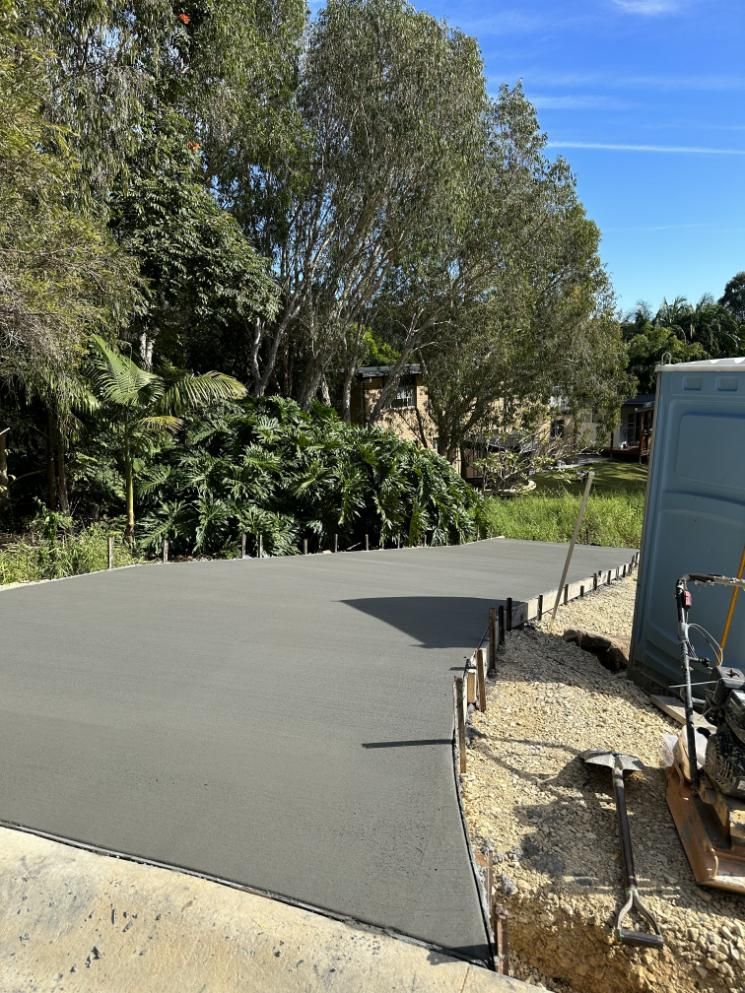 A Concrete Driveway Is Being Built In The Backyard Of A House — Hinterland Concreting Pty Ltd In Lennox Head, NSW