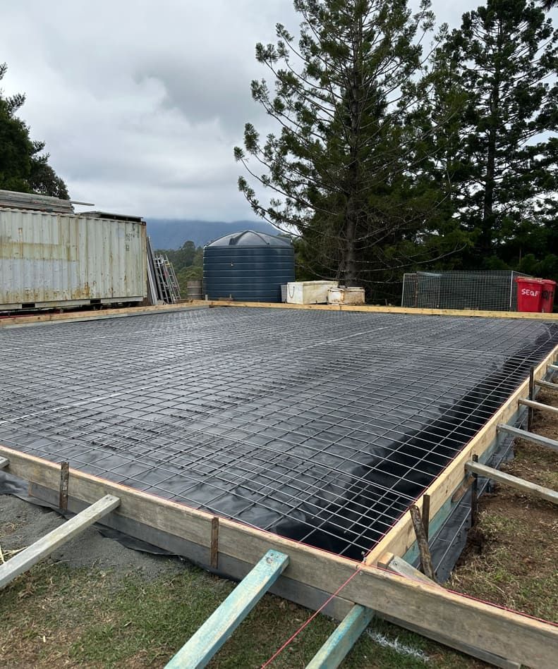 A Concrete Base For A House Is Being Built — Hinterland Concreting Pty Ltd In Lennox Head, NSW