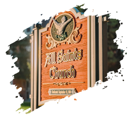 Sign for All Saints Church with a golden emblem and carved lettering.