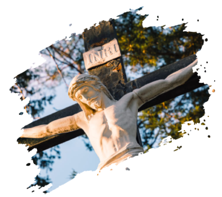 Jesus Christ on the cross, pale statue with outstretched arms; INRI sign above.