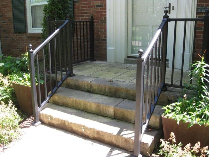 Set of Stairs Leading up To a House with A Railing — Columbia, MO — Naugle Construction Company