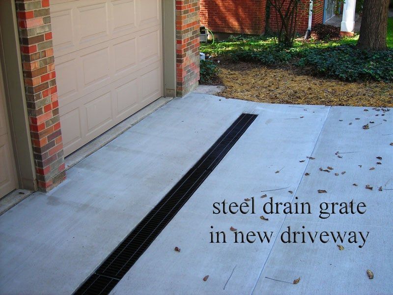 Steel Drain Grate in A Driveway — Columbia, MO — Naugle Construction Company