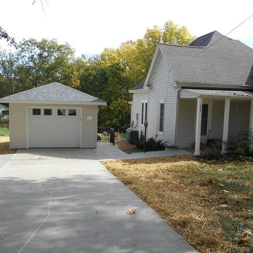 A White House with A Garage Next to It — Columbia, MO — Naugle Construction Company