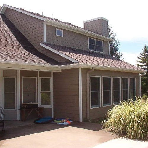 A House with A Lot of Windows and A Roof — Columbia, MO — Naugle Construction Company