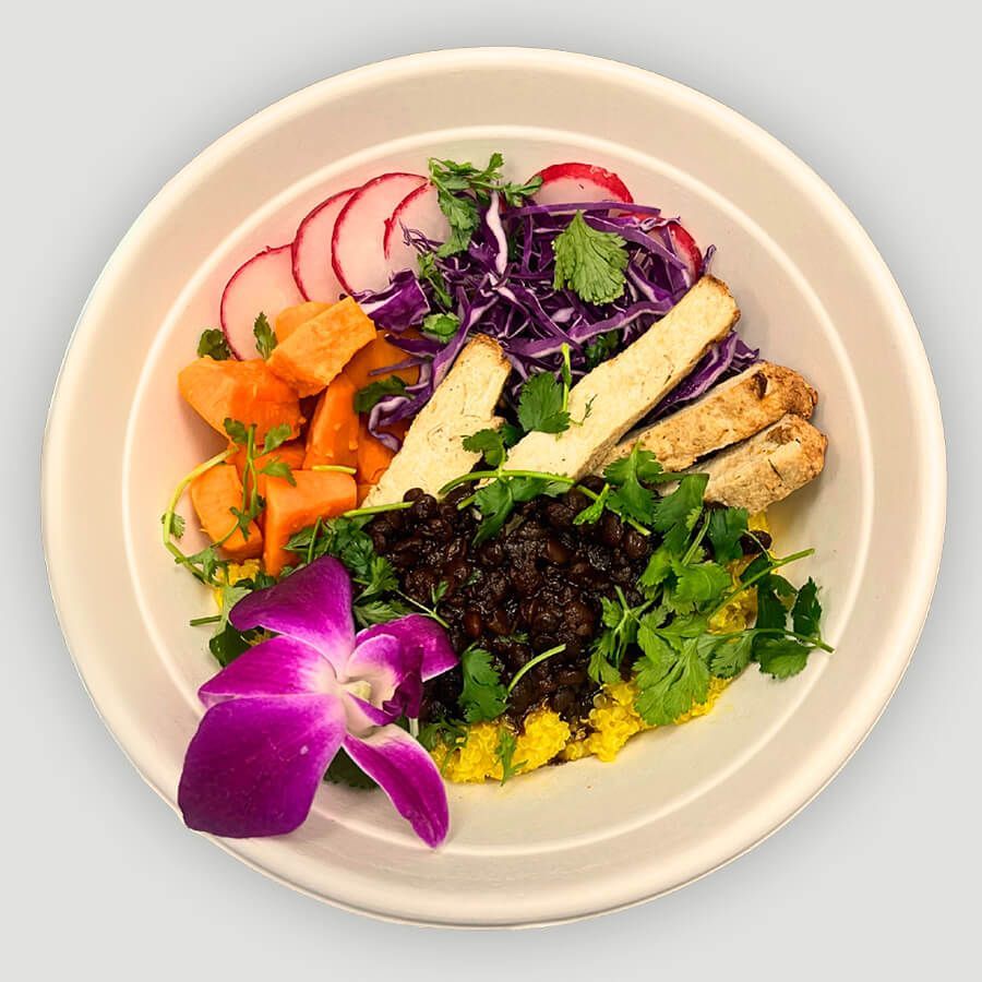 A bowl of food with a fork in it.