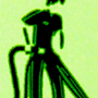 Green-tinted silhouette of a carpet cleaner