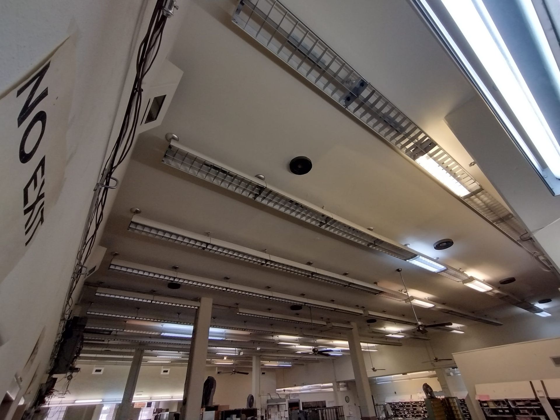 A large room with a sign on the wall that says no entry