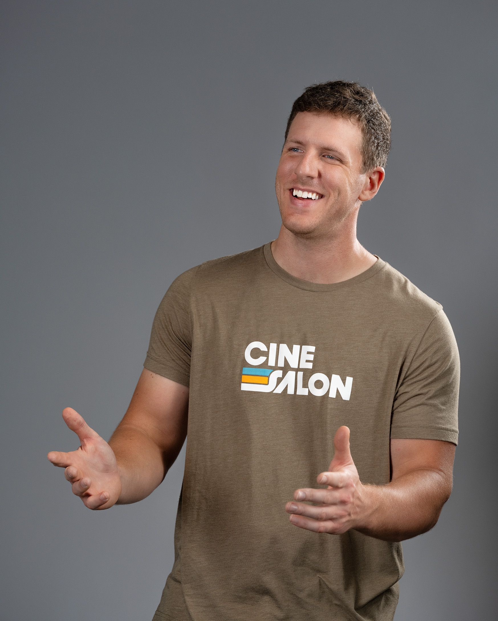 Shane Yeager is wearing a t-shirt that says cinesalon