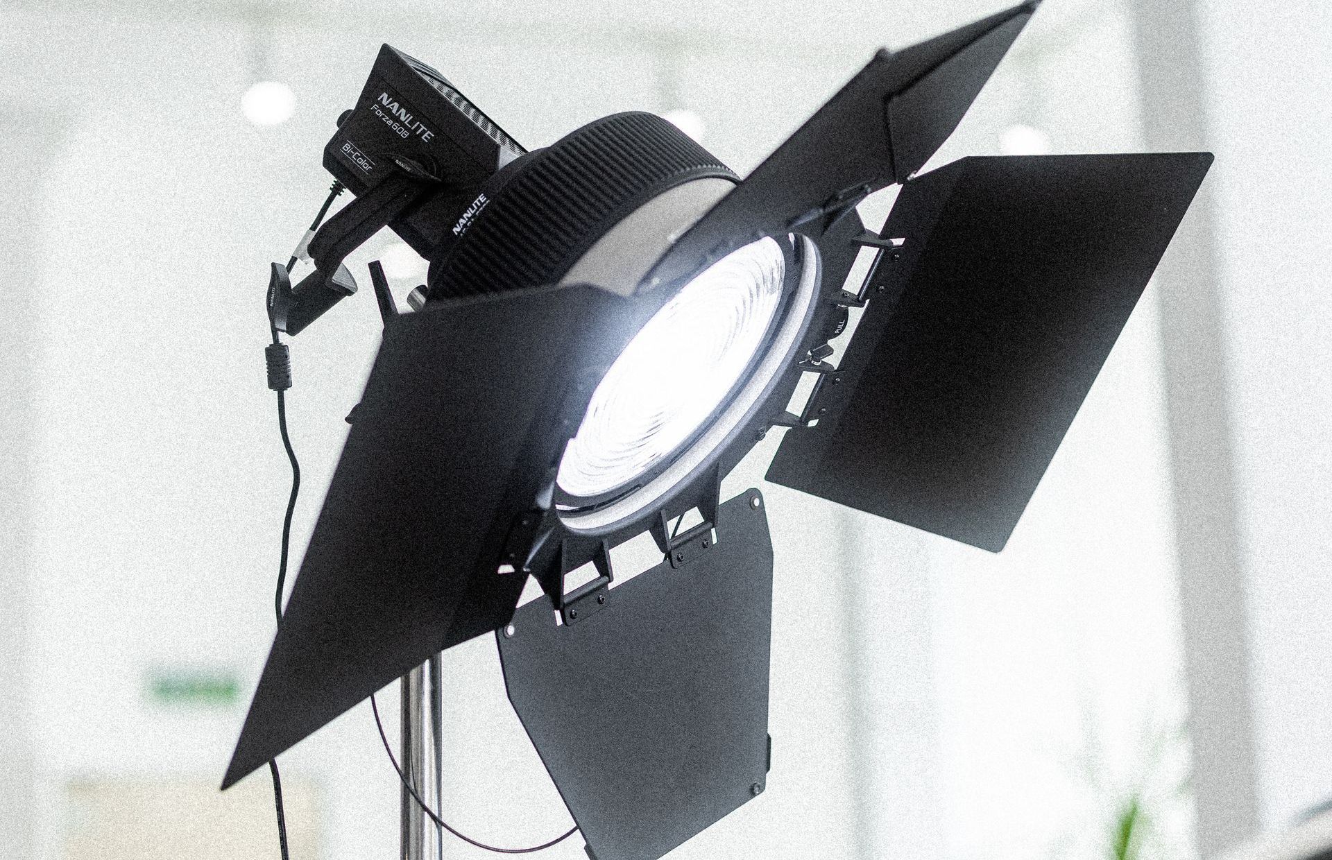 A black and white photo of a light on a stand.