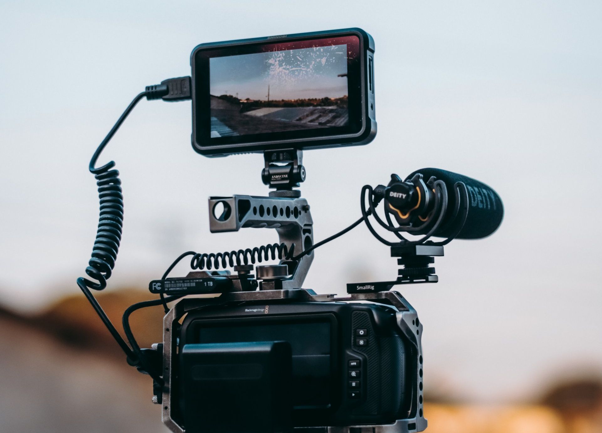 A close up of a camera with a microphone attached to it.