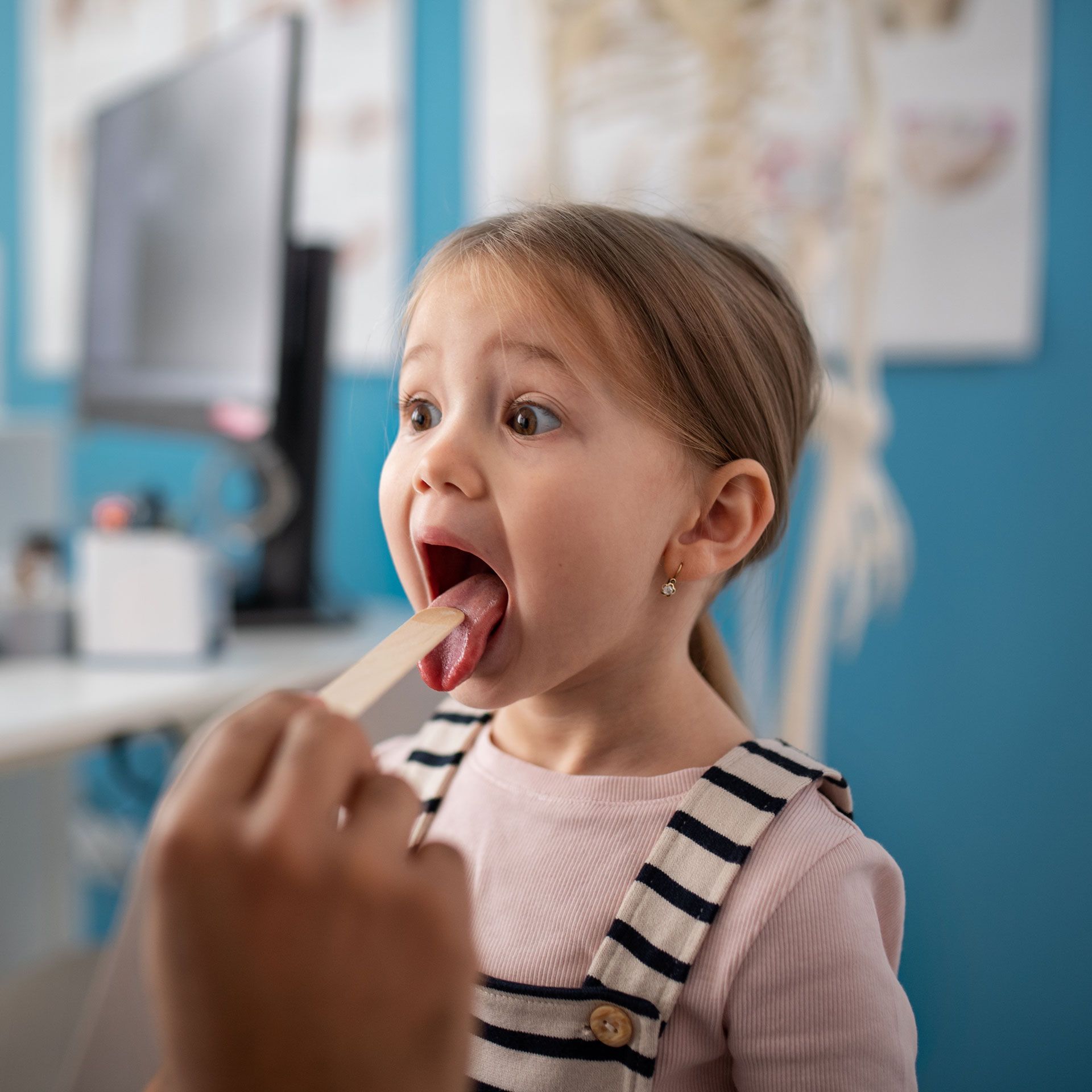 Looking The Mouth Of A Preschooler | Anchorage, AK | James D. Briggs MD