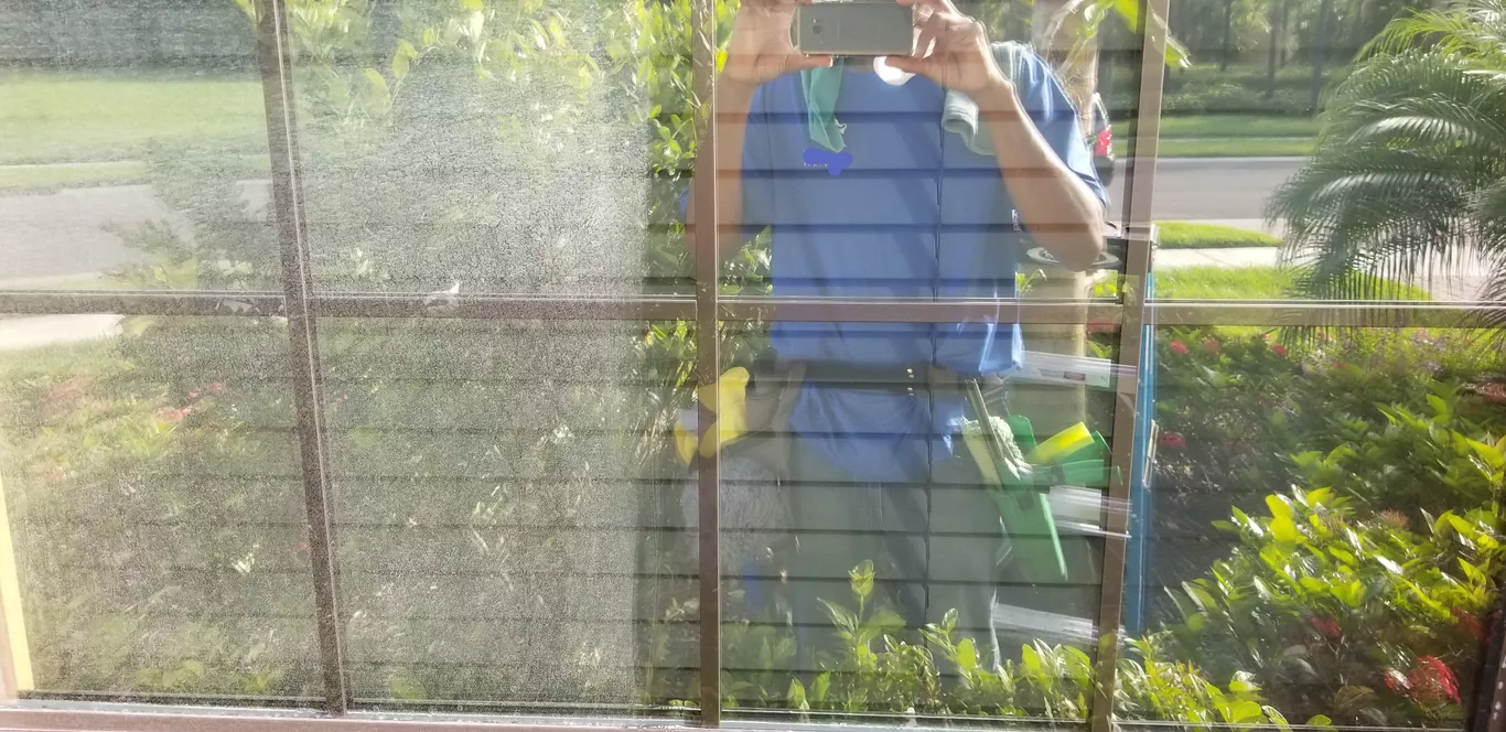 A man is taking a picture of himself in a mirror