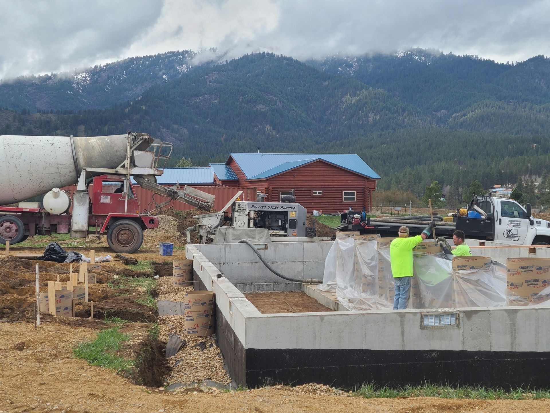 Residential foundation work with mixer truck on-site, installed by Waypoint Concrete in Meridian, ID.