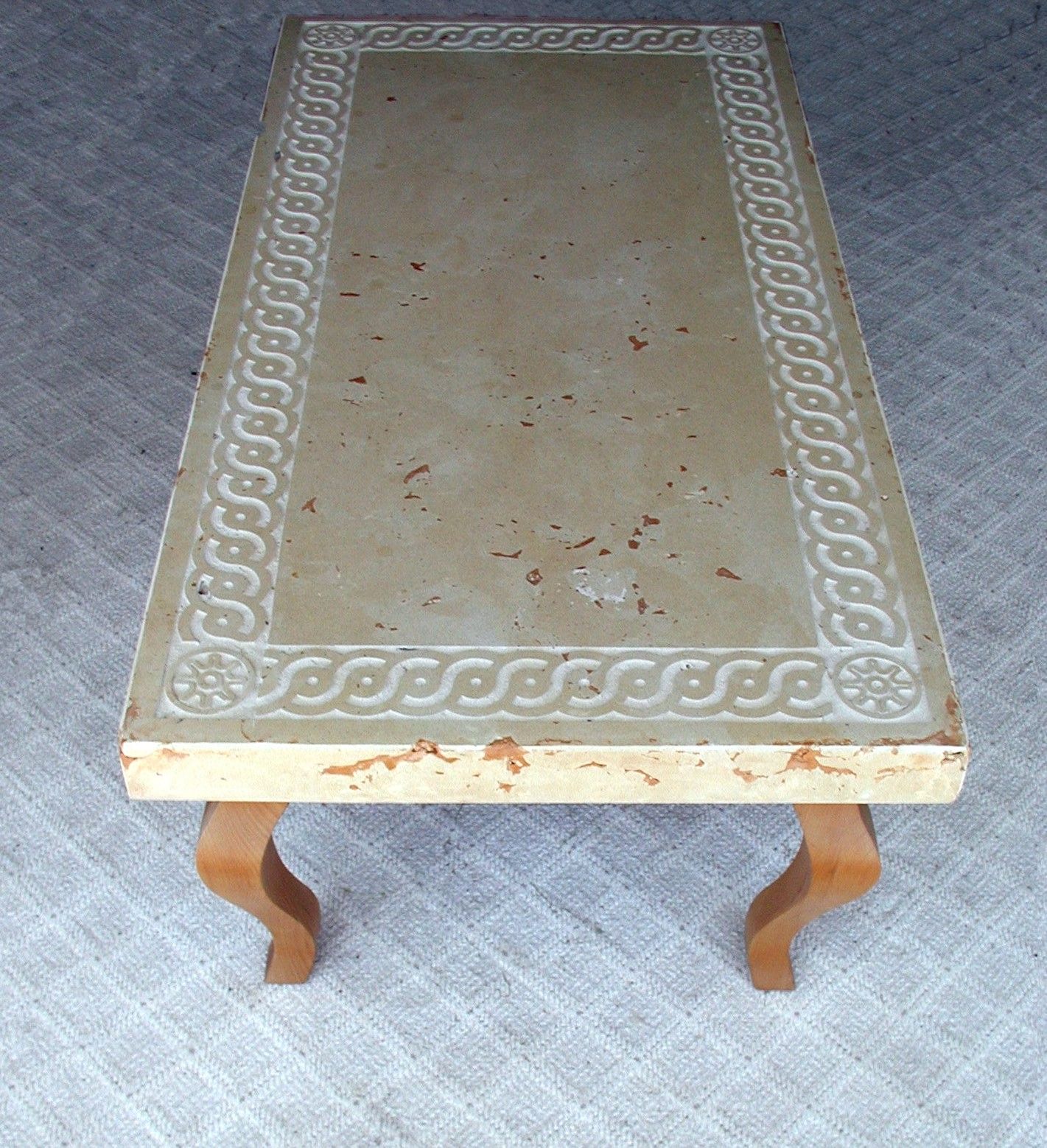 Waypoint Concrete created a decorative concrete countertop with ornate detailing for a table in Weiser, Idaho.