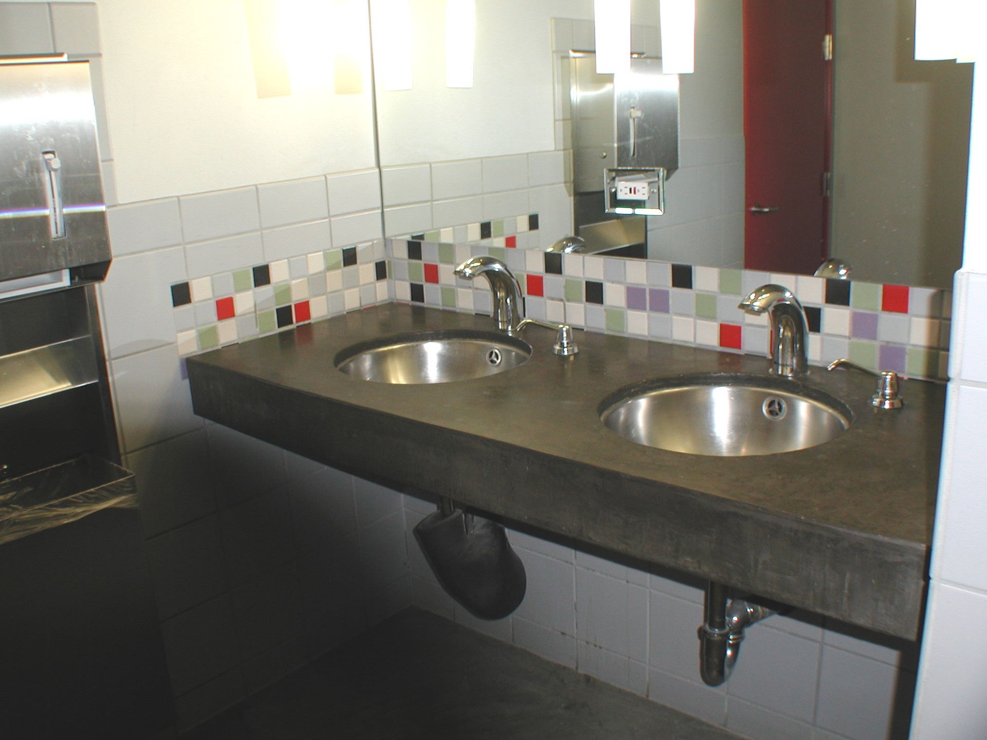Waypoint Concrete formed a double-sink concrete countertop with backsplash for a restaurant in Nampa, Idaho.