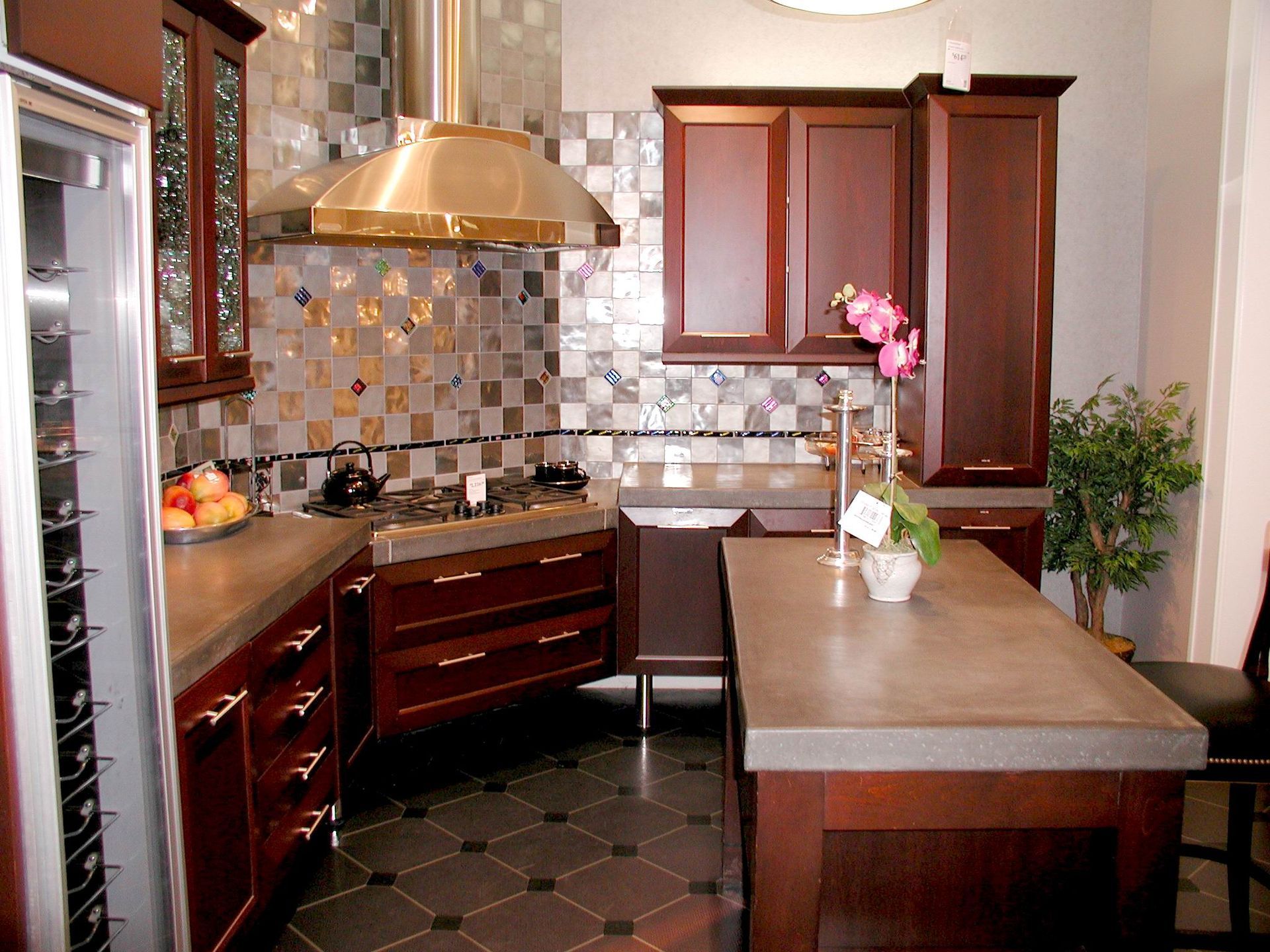 Waypoint Concrete installed a decorative concrete island with a warm finish for a kitchen in Eagle, Idaho.