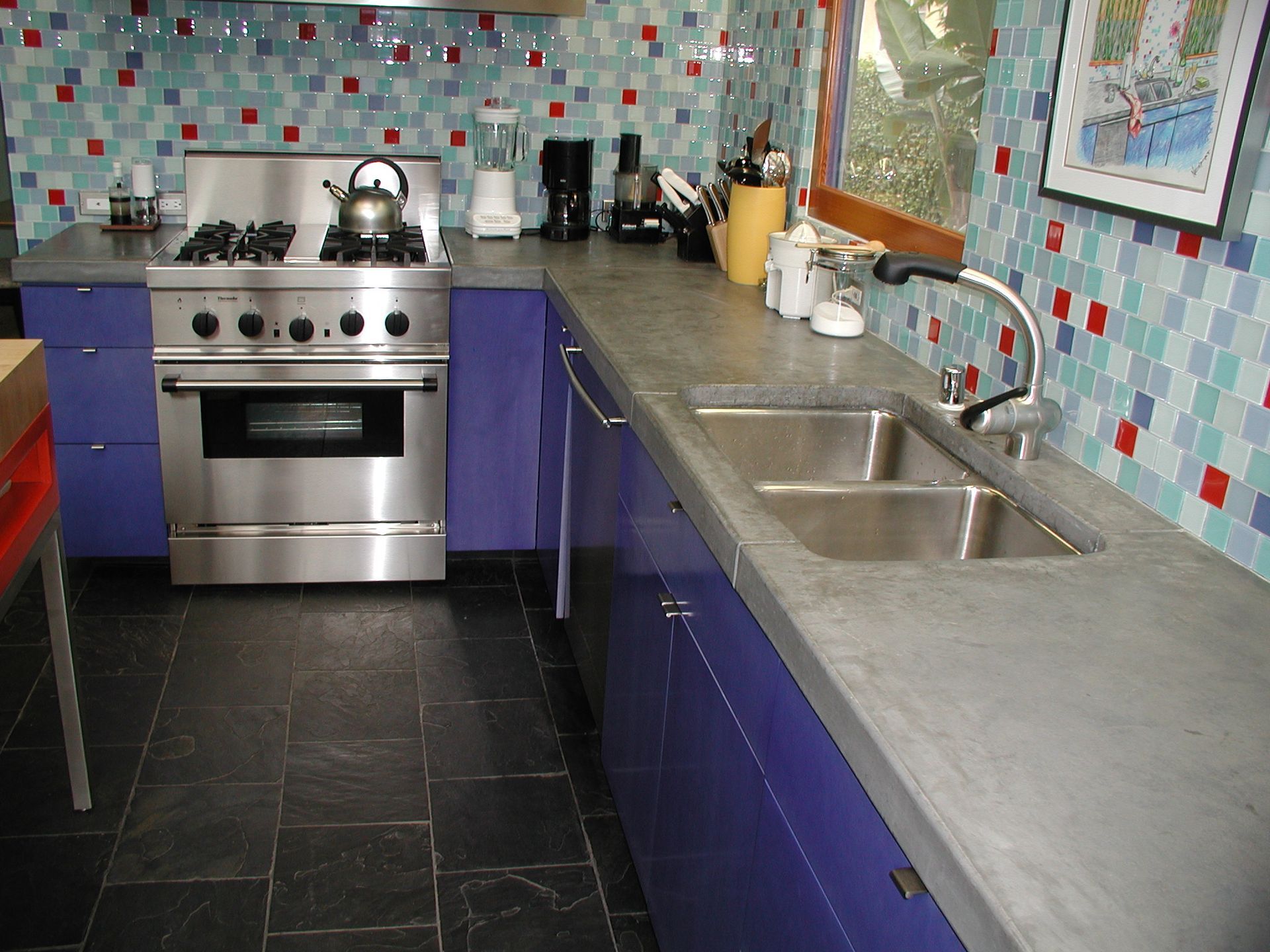 Waypoint Concrete completed a dark concrete countertop with bold modern backsplash in Boise, Idaho.