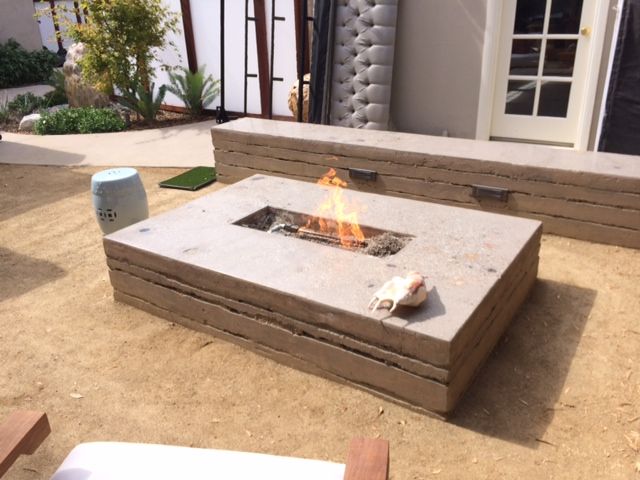 Waypoint Concrete designed a modern outdoor fire table with decorative concrete top in Star, Idaho.