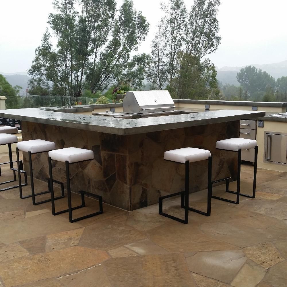 Waypoint Concrete completed a natural stone-faced outdoor kitchen with concrete countertop in Emmett, Idaho.
