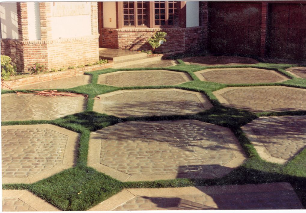 Waypoint Concrete created a unique concrete grid pattern with grass infill for a front yard in Meridian, Idaho.