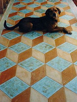 Waypoint Concrete crafted a colorful epoxy floor with a 3D tile pattern design in a gallery in Fruitland, Idaho.