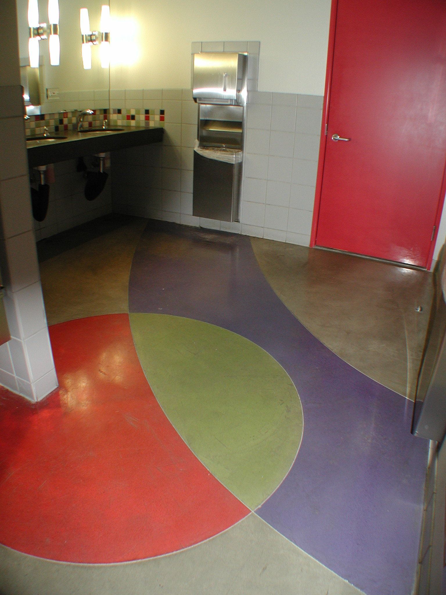 Waypoint Concrete delivered a vibrant decorative concrete floor with custom curves in a space in Wilder, Idaho.