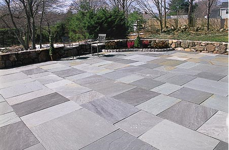 Waypoint Concrete built a modern square-pattern paver patio with alternating gray tones in Eagle, Idaho.