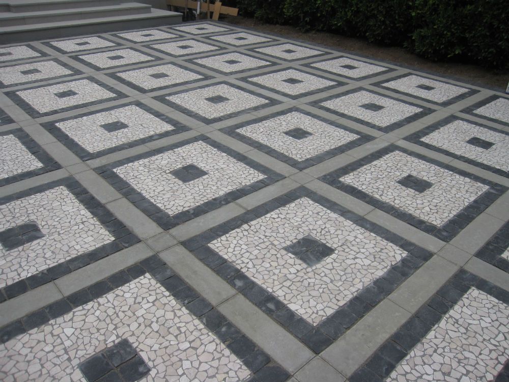 Waypoint Concrete installed geometric patterned pavers with alternating dark and light stone in Star, Idaho.