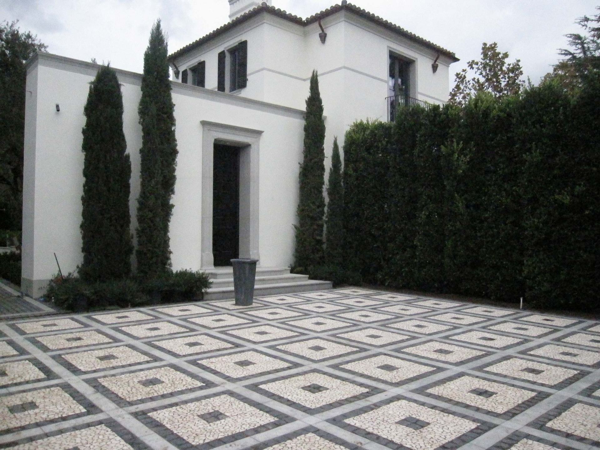 Waypoint Concrete installed patterned masonry pavers for a stylish European-inspired patio in Hidden Springs, Idaho.