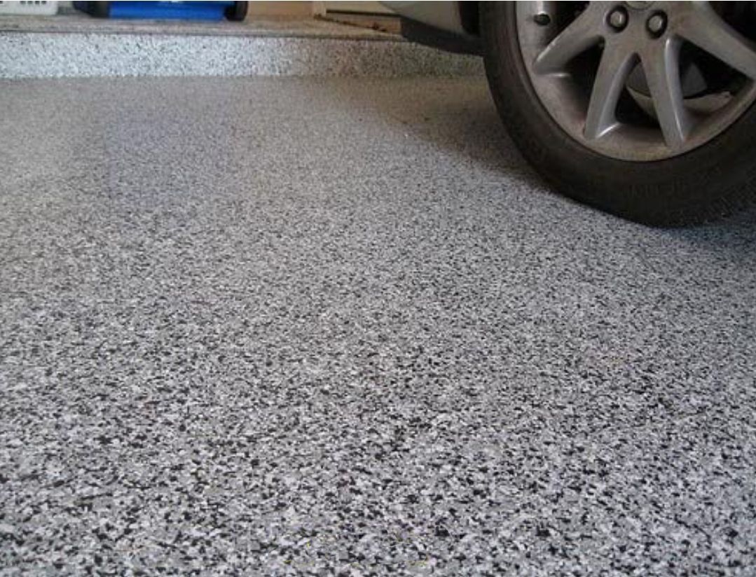 Waypoint Concrete completed a flake epoxy garage floor with high traction finish in a home in Emmett, Idaho.