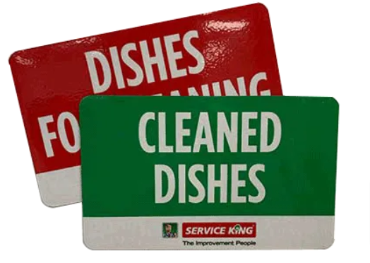 A red and green sign that says dishes for cleaned dishes